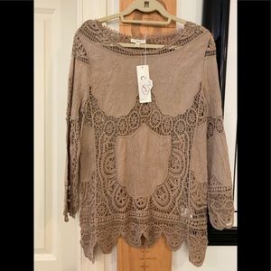 Ladies Lacy Top Size S/M color is Beige NWT